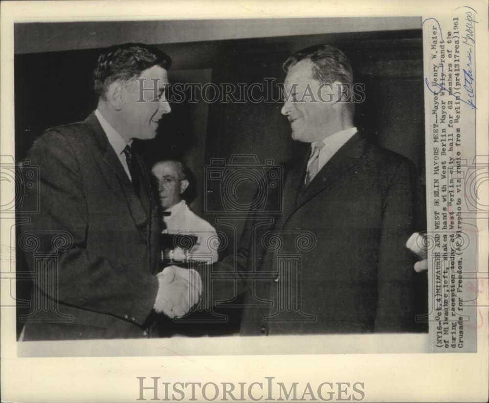 1961, Henry Maier and Willy Brandt shake hands, West Berlin City Hall - Historic Images