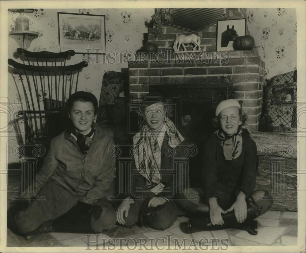 1934, Joanne Sullivan, Helen Fischer, Marion Schultz by fireplace - Historic Images
