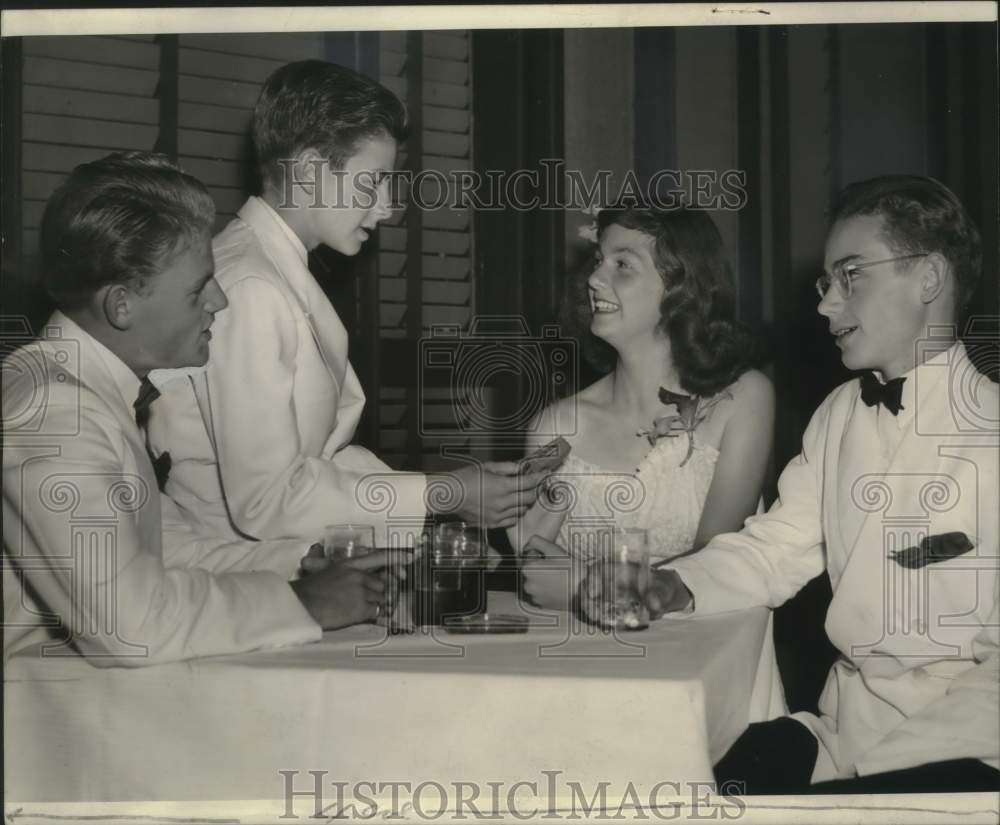 1941, Patsy Rogers and others partying at a holiday dance party. - Historic Images