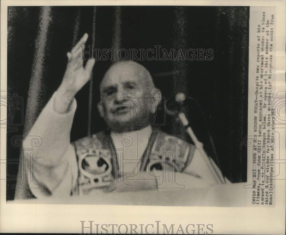 1963, Pope John XXIII blessing a crowd from his window in the Vatican - Historic Images