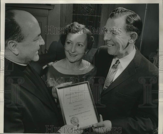 1959 Mr. & Mrs John Quinn receiving award from Marquette University - Historic Images