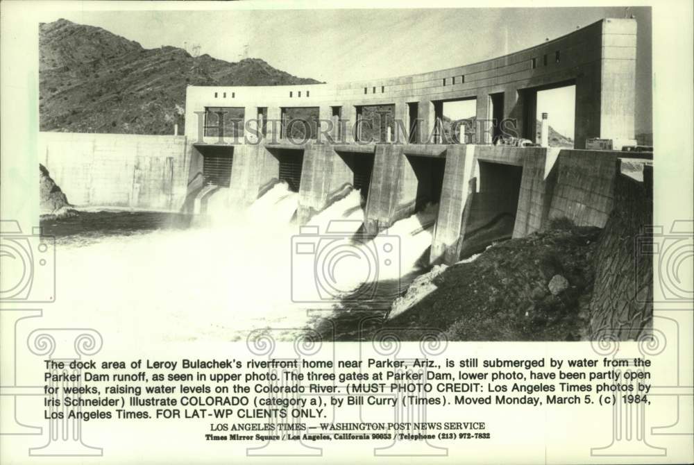 1984 Press Photo Water flowing through open gates of Parker Dam, Arizona - Historic Images