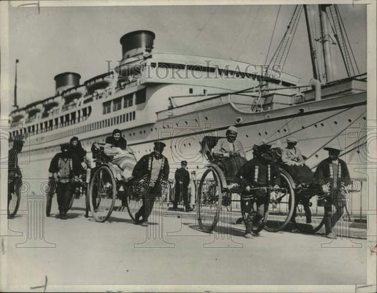 1934, Tourists going for ricksha rides in Japan - mjc28923 - Historic Images