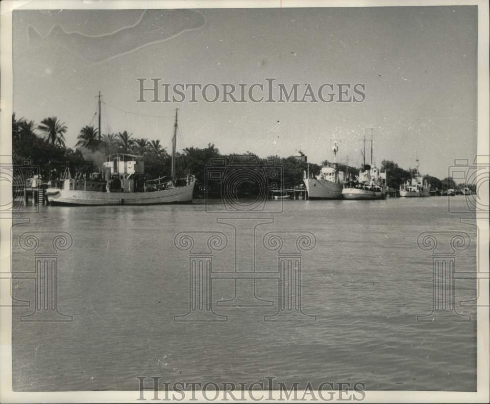 1951, Iranian gunboats anchored in the Karun River, Abadan, Iran - Historic Images