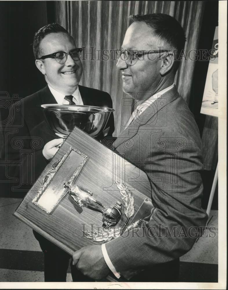 1963, William Stitch receives sales award from Dick Snow; Milwaukee - Historic Images