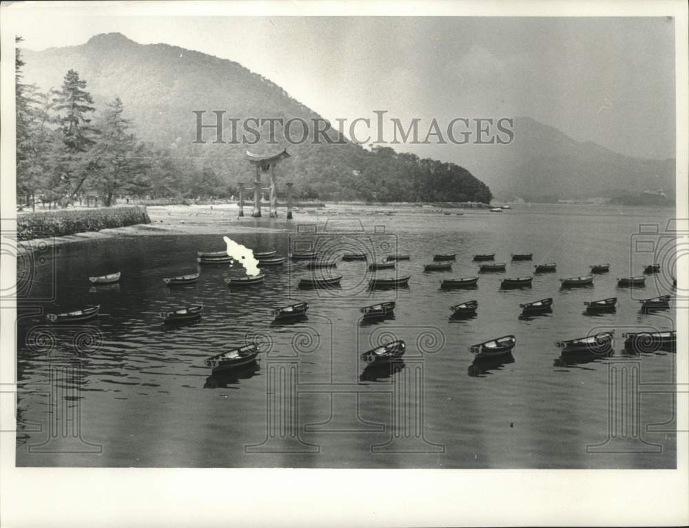 1967, Rowboats in the water near Tori Gate on Japan&#39;s Miyajima Island - Historic Images