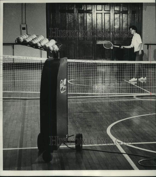 1966 Press Photo Tennis ball throwing machine at the Milwaukee YMCA - mjc30640 - Historic Images