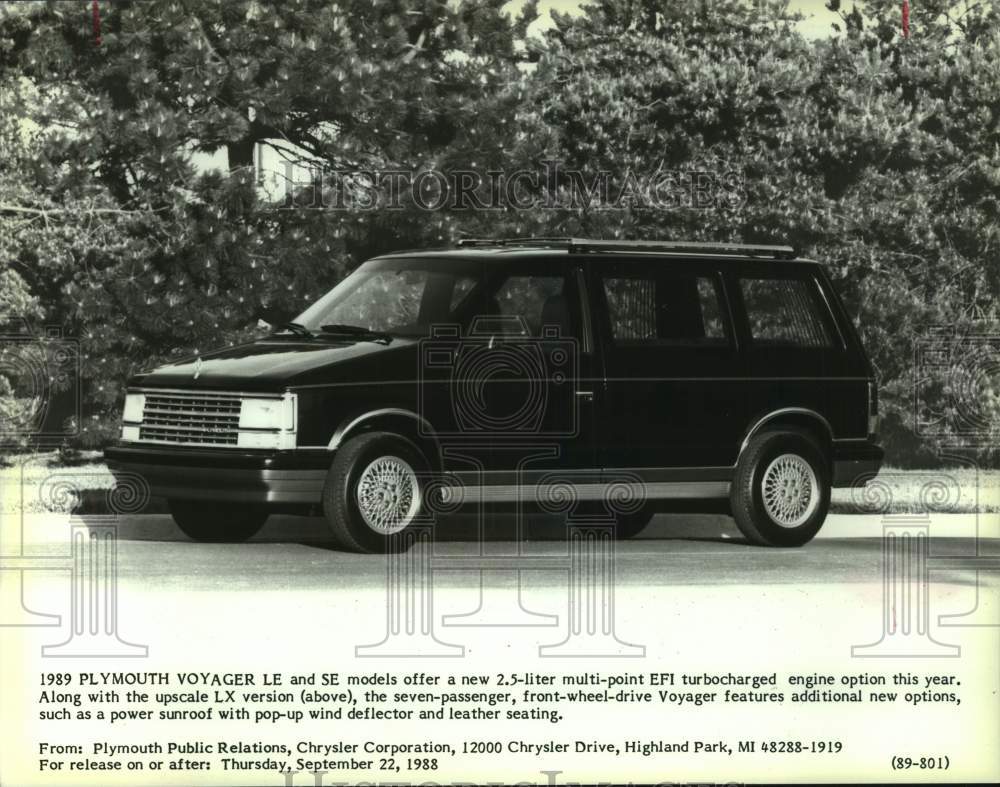 1988 Press Photo Promotional photo of a 1989 Plymouth Voyager LX parked in road - Historic Images