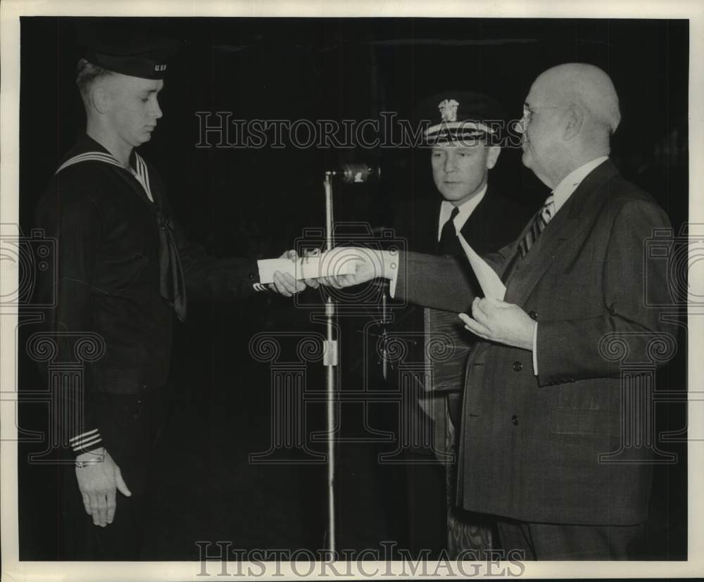1952, Irving Seaman and Letts awards Quinn at Naval Training Center - Historic Images