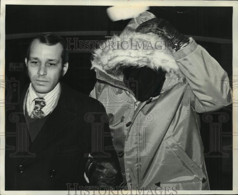 1972, Led by Richard J. Steinberg, an unidentified masked witness. - Historic Images