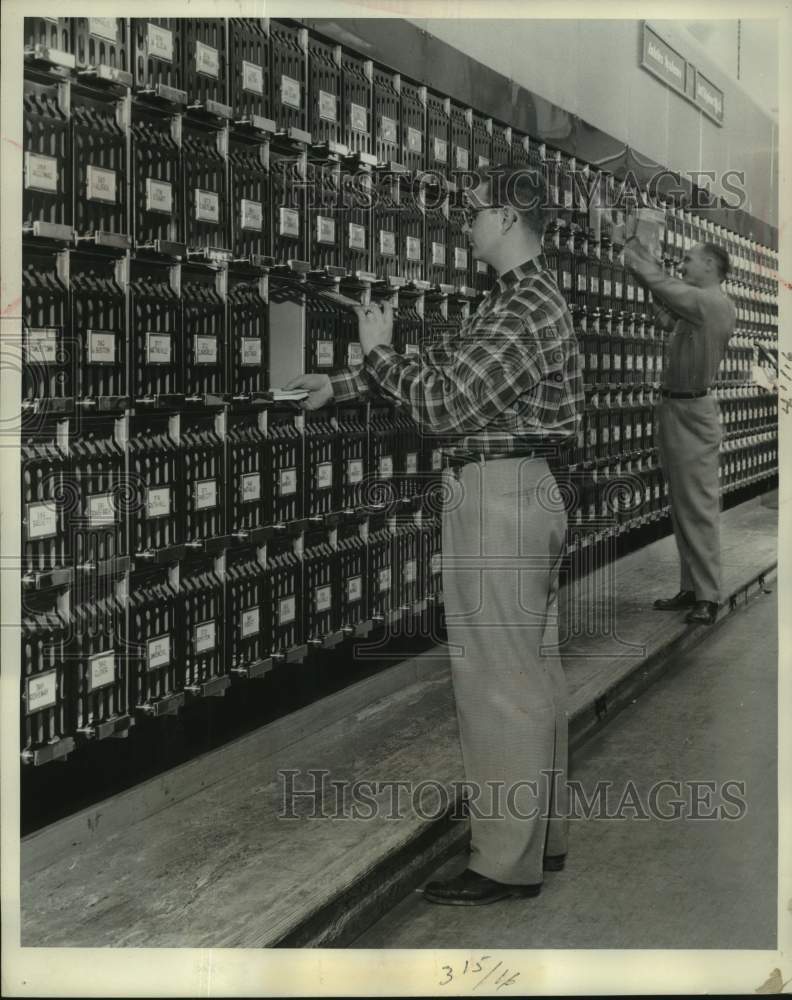 1958, Coded mail goes into receptacles for particular destinations. - Historic Images