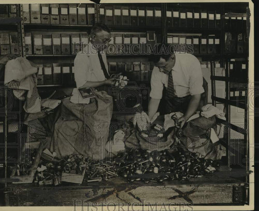 1925, Workers sort items in the "dead letter" office of the war dept. - Historic Images