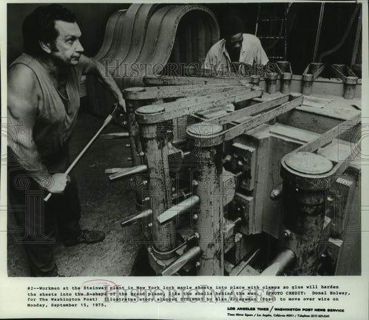 1975 Press Photo Workmen at the Steinway plant building a grand piano, New York - Historic Images