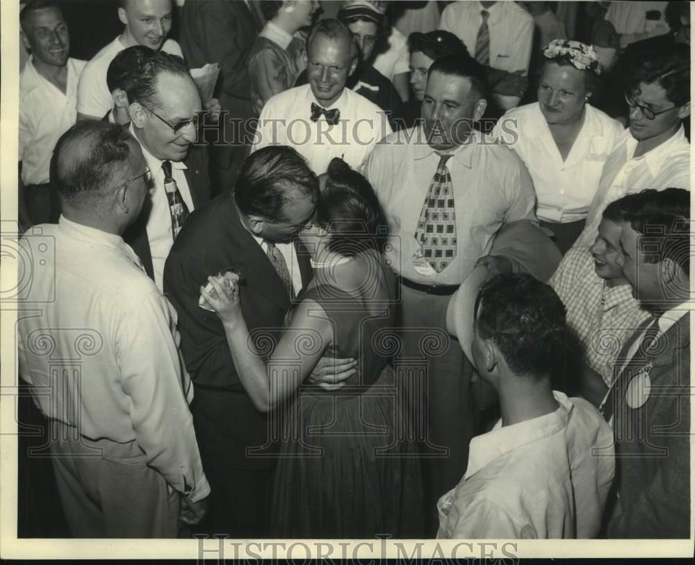 1953, Senator Joseph McCarthy getting kissed at convention, Madison - Historic Images