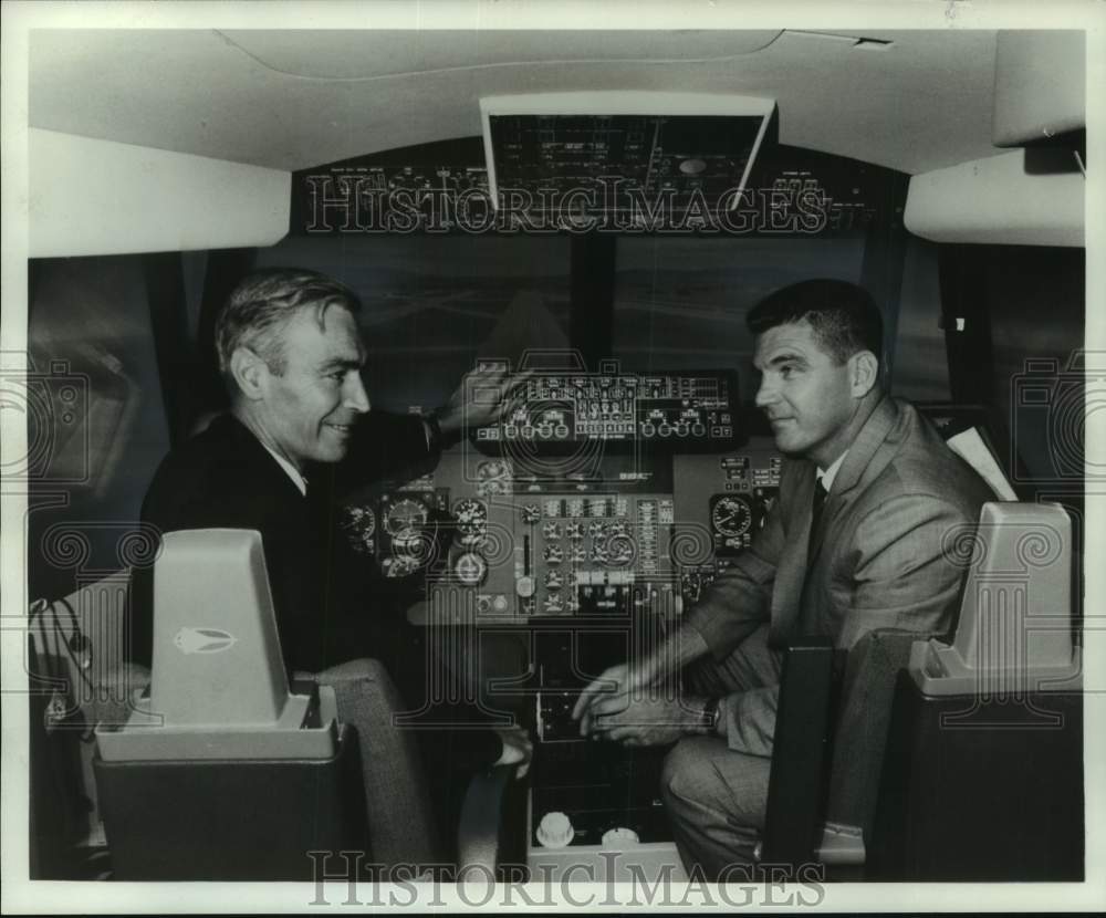 1966, Lockheed Aircraft Corp officials in cockpit at pilot&#39;s panel. - Historic Images