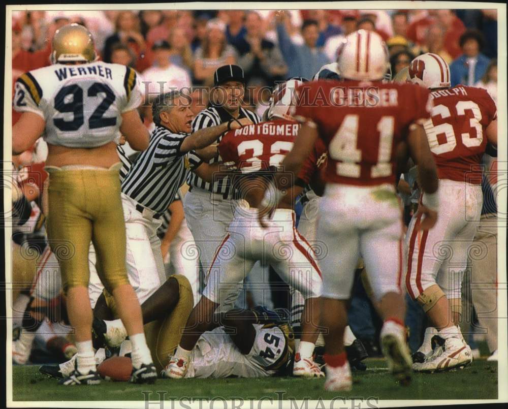 1994 Press Photo University of Wisconsin Rose Bowl game erupts into fighting. - Historic Images