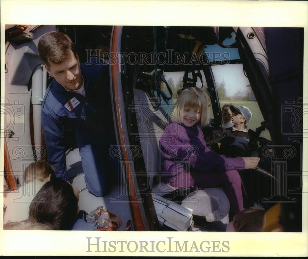 1994 Press Photo Alana Billings sits in helicopter cockpit during school - Historic Images