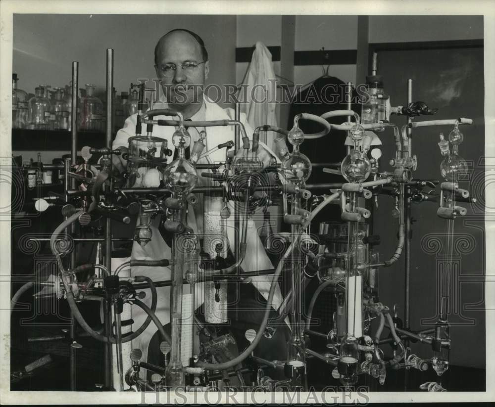 Press Photo Dr. Harold P. Rusch, checks Lab Apparatus, UWM - mjc33662 - Historic Images
