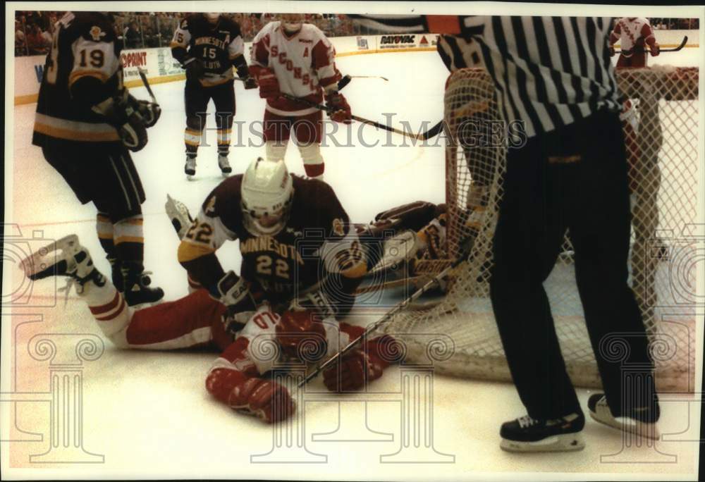 1994 Press Photo Greg Hanson and Kelley Fairchild during hockey game - mjc33673 - Historic Images