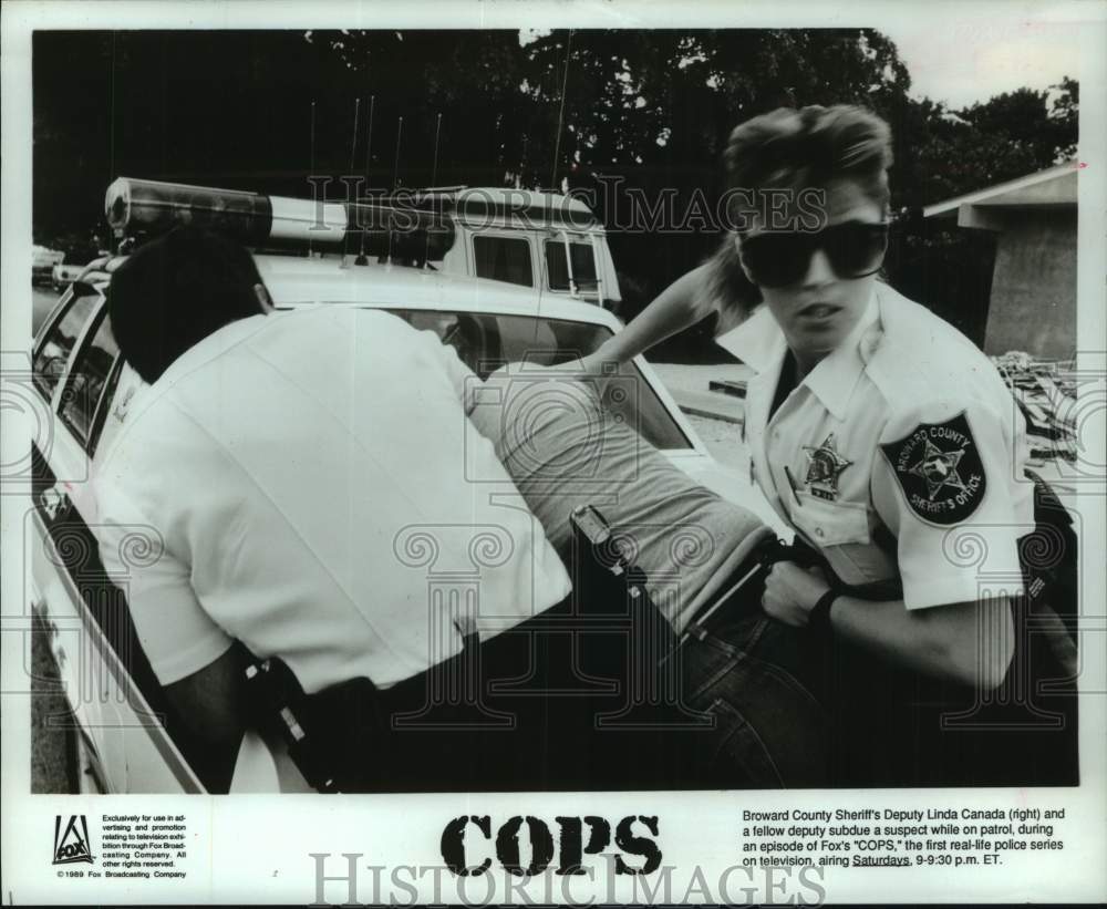 1990 Press Photo Suspect subdued in scene from &quot;Cops&quot; - mjc33757 - Historic Images