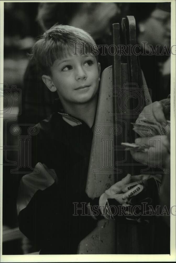 1993 Press Photo Forrest Derse holds antique ironing board at the Barn Sale - Historic Images
