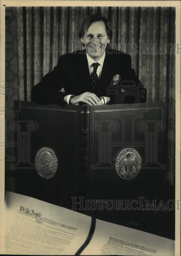 1988 Press Photo French Publisher Edouard Weiss with Book &quot;We The People&quot; - Historic Images