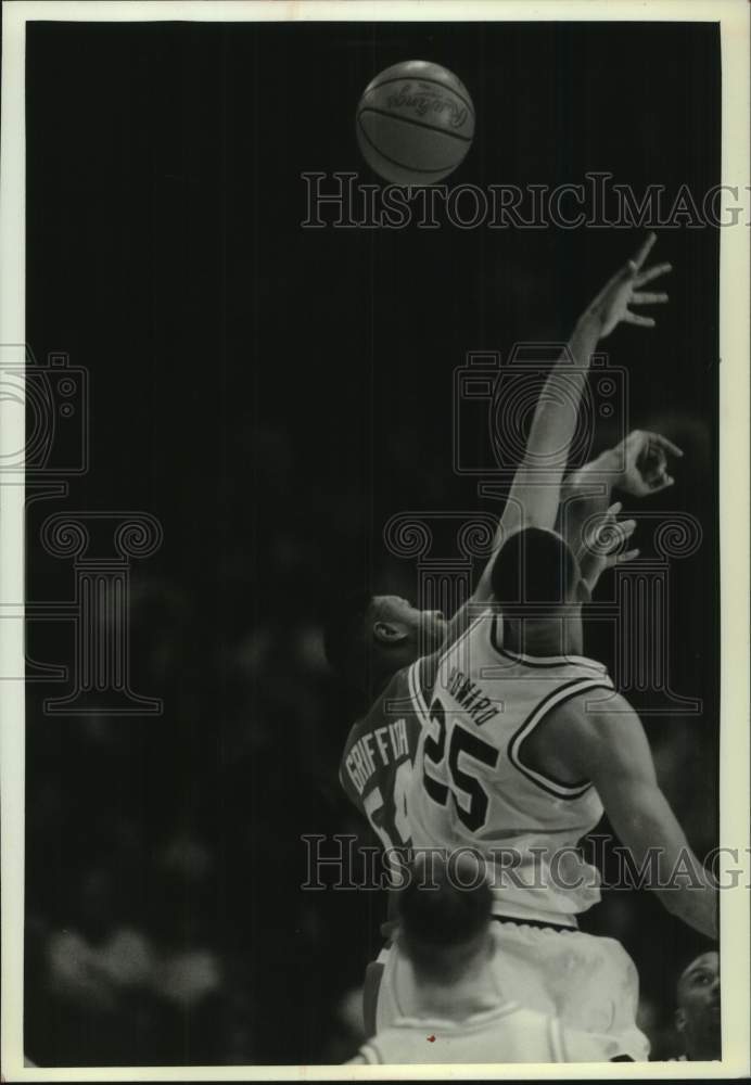 1994 Milwaukee Basketball&#39;s Rashard Griffith in tipoff vs Michigan - Historic Images