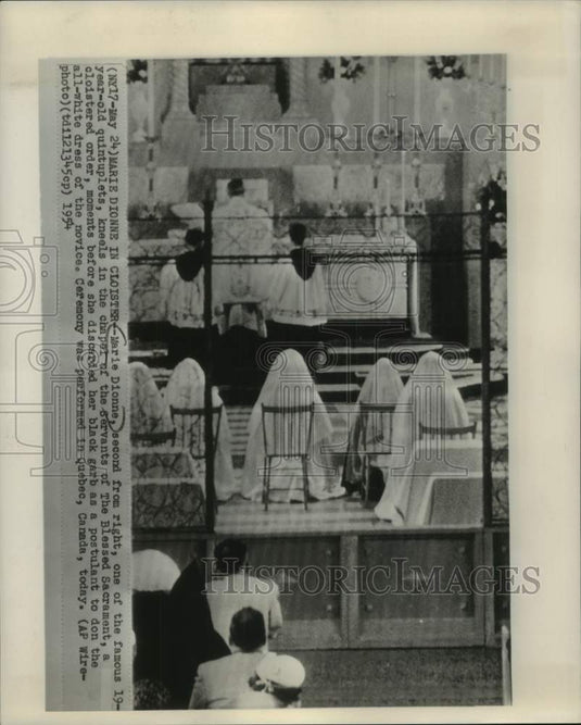 1954, Marie Dionne in cloister at ceremony, Quebec, Canada. - Historic Images