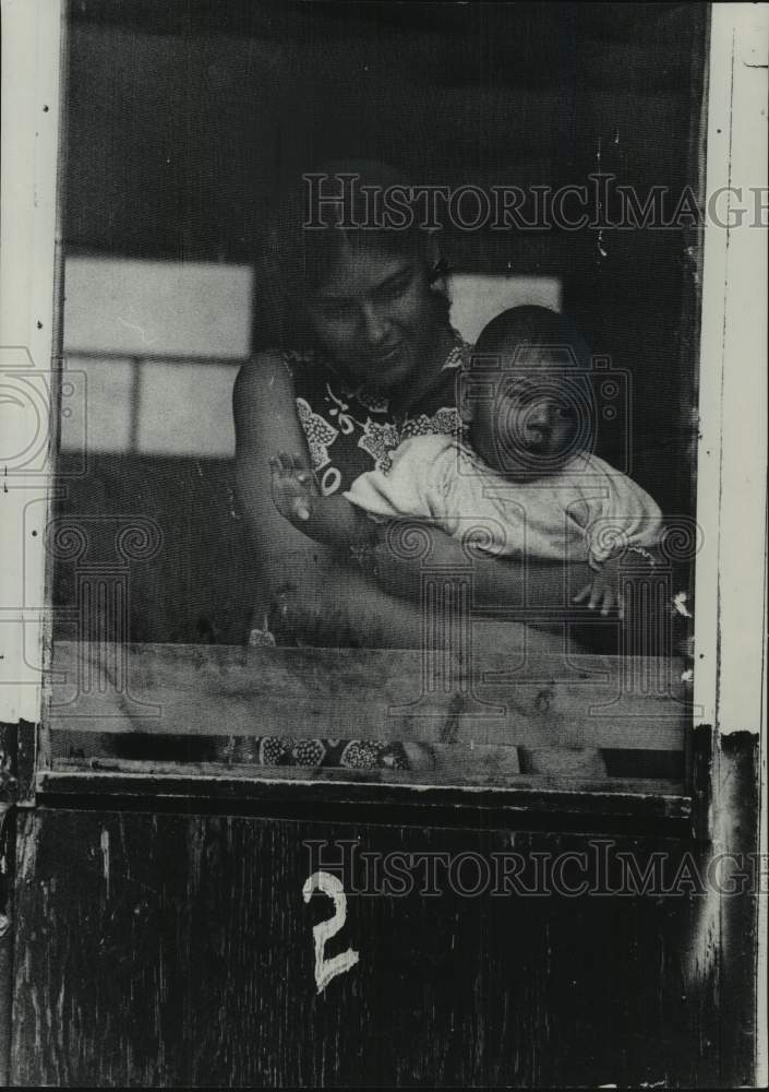 1972, Mother and child at Shiocton Migrant Worker Camp - mjc35004 - Historic Images
