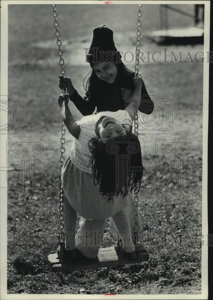 1976 Press Photo Migrant children playing on playground in Plainfield, Wisconsin - Historic Images