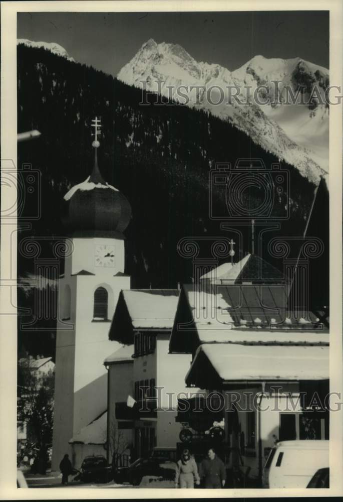 1988, Onion-bulb towers January afternoon in St. Anton, Austria. - Historic Images