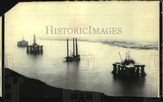 1976, Four offshore drilling platforms on coast of Houston, Texas - Historic Images
