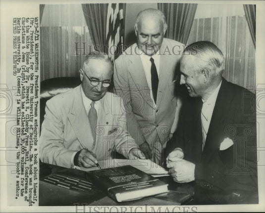 1952 President Truman autographs book, "Mr. President" with others - Historic Images
