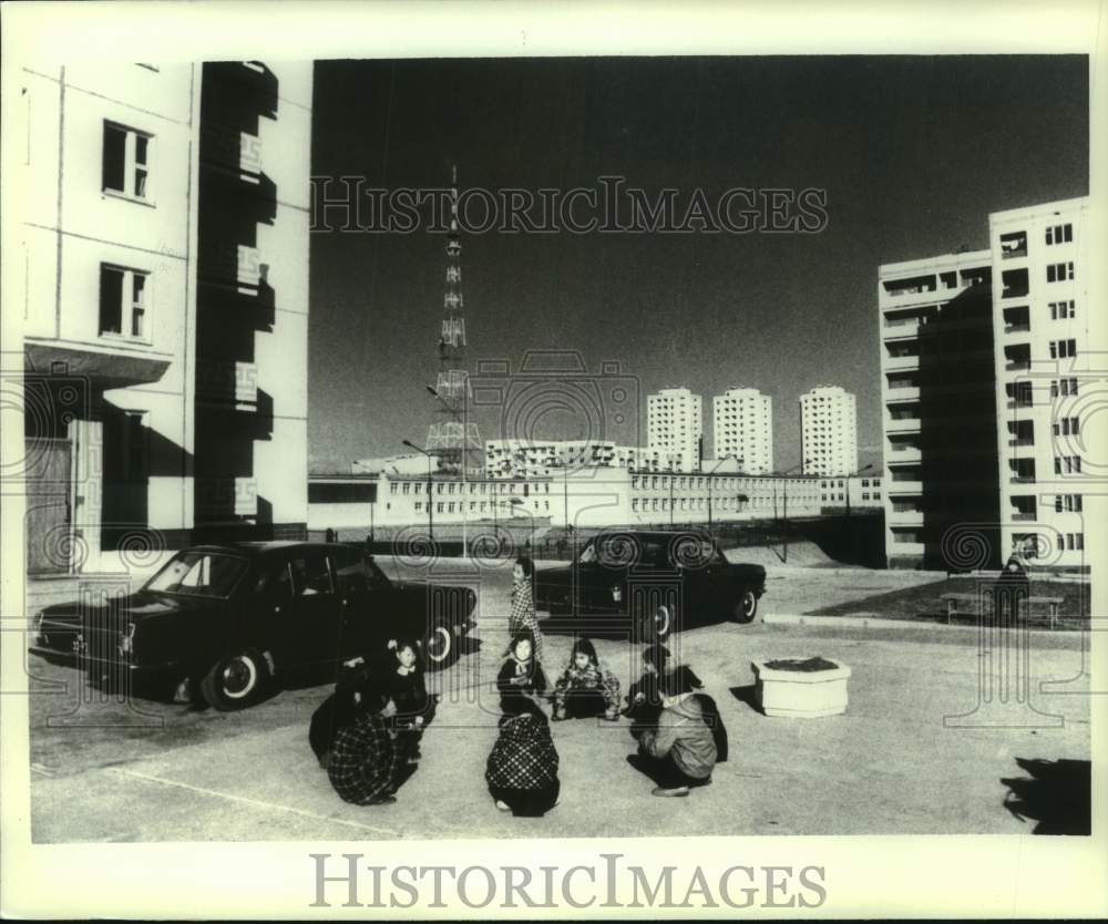 1982, Youngsters gather near modern housing in Ulan Bator - Historic Images