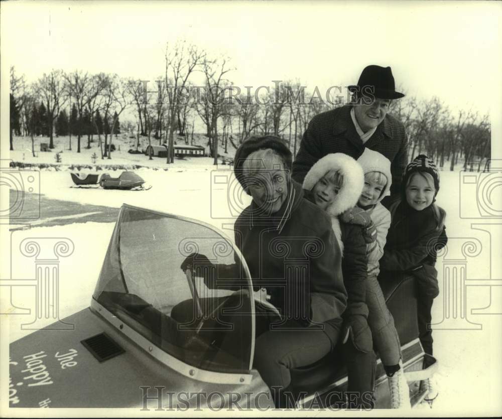 1971, Hubert Humphrey, wife and granddaughters play in snow, Waverly - Historic Images