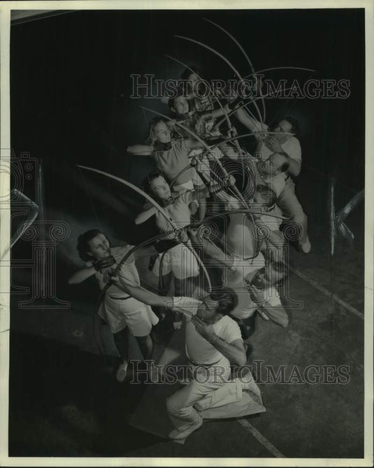 1939, Members of Milwaukee Archers' Association practice a formation - Historic Images