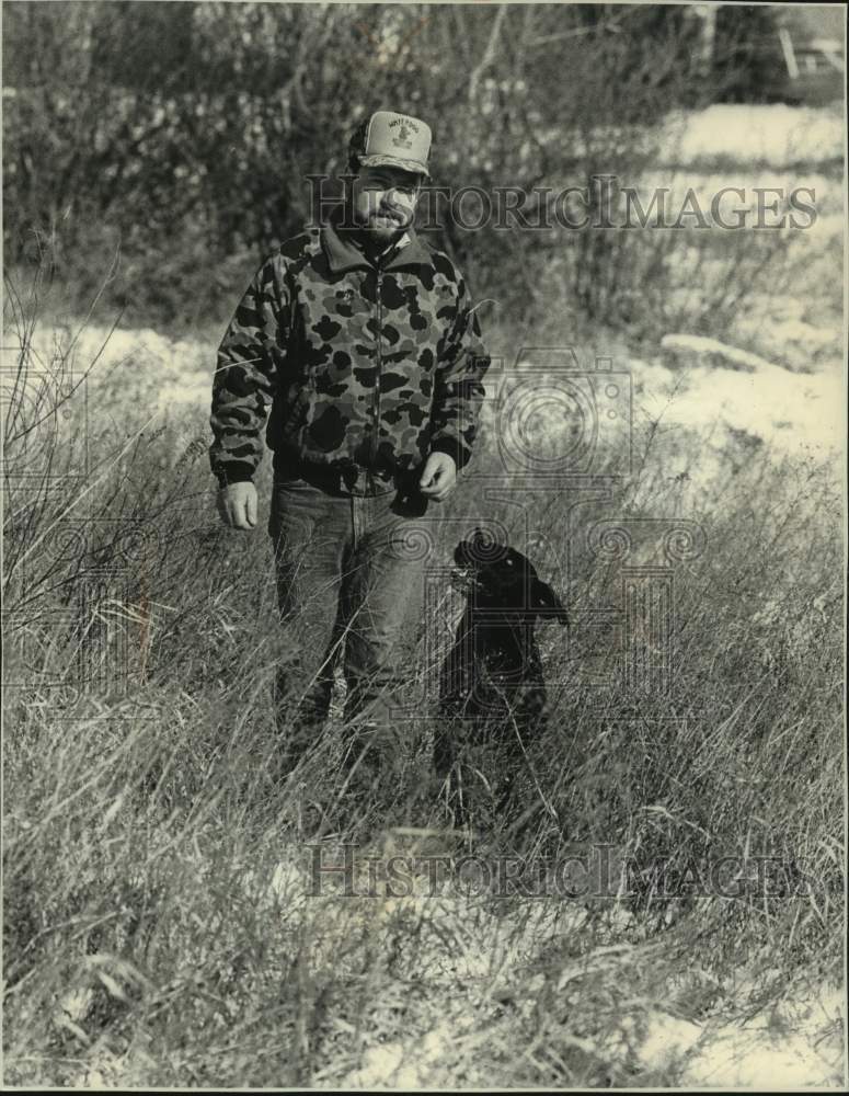 1989 Press Photo Dog trainer Doug Kennedy of Dousman & his dog Shooter - Historic Images