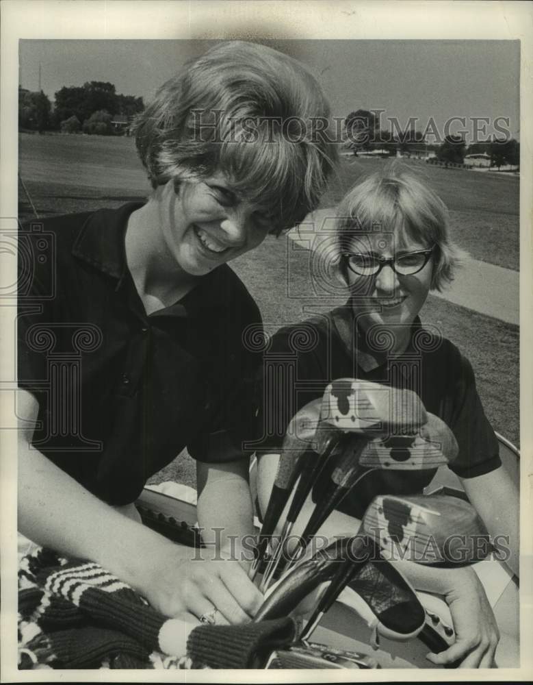 1965 Carol Sorensen with Mary Appleton at division title, Wisconsin. - Historic Images
