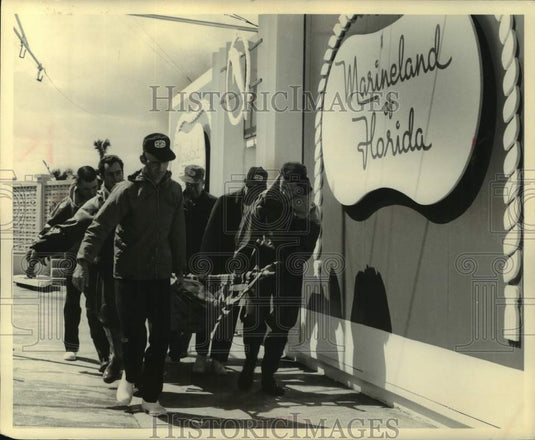 1965, Marineland workers run drill for Milwaukee Sentinel Sports Show - Historic Images