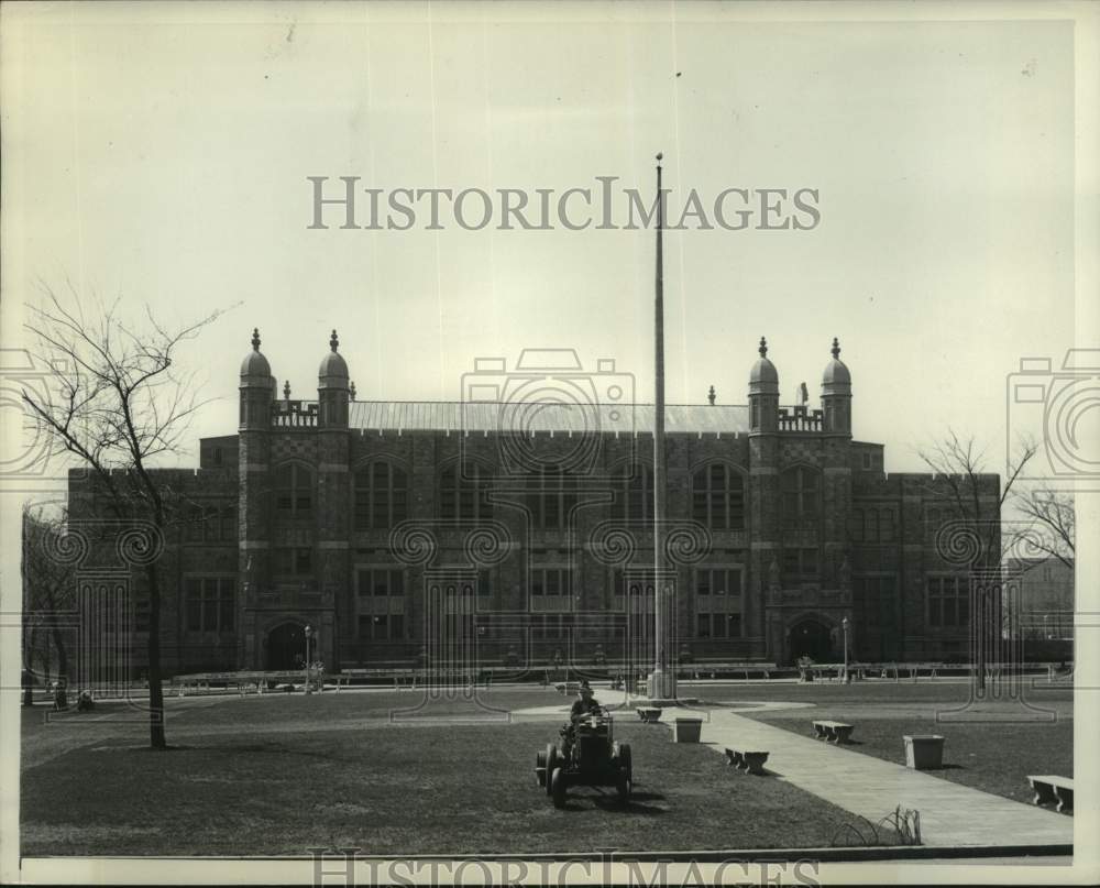 1946, Man on tractor in front of building at Hunter College - Historic Images