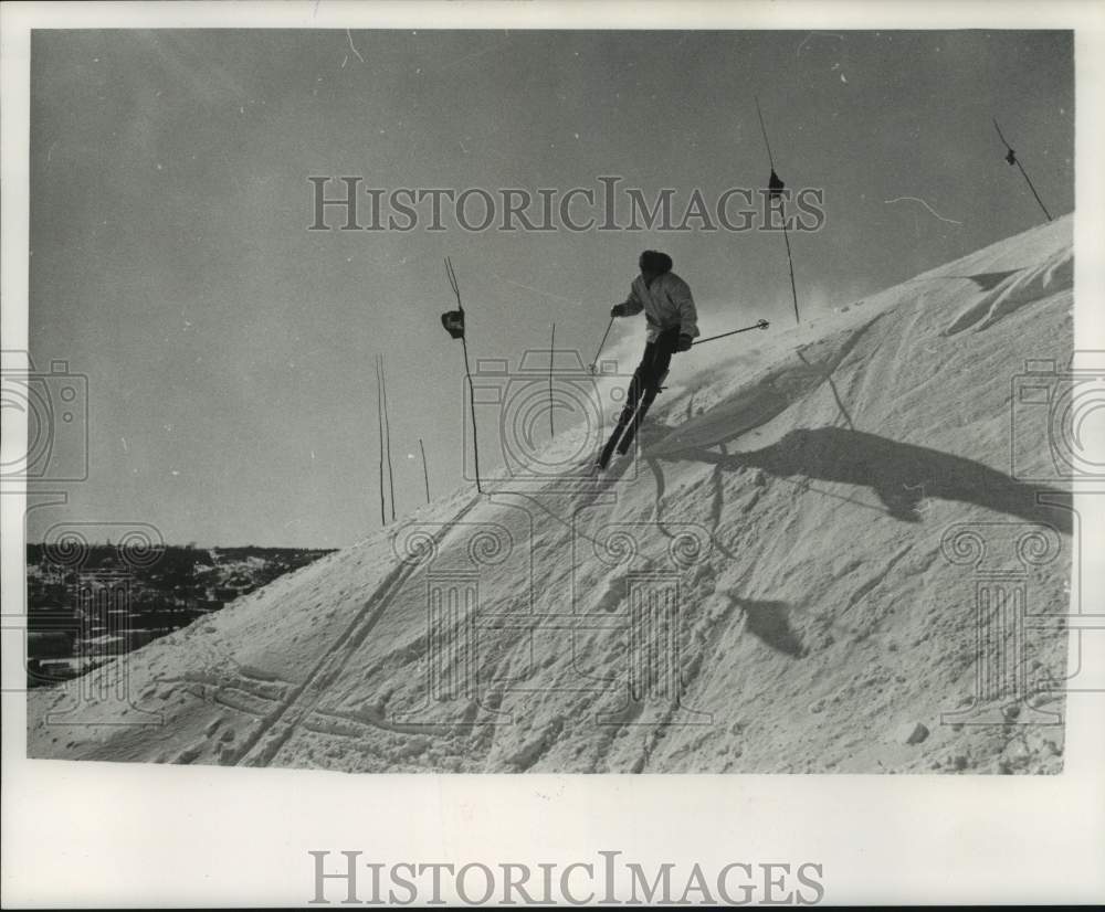 1963 Skier on a slalom course - Historic Images