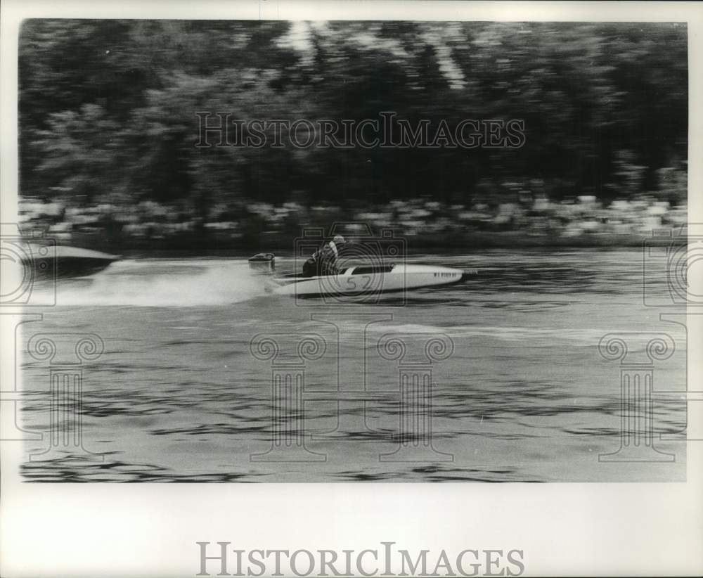 1962 Number 52 boat streaks along the river at Waukesha&#39;s Frame Park - Historic Images