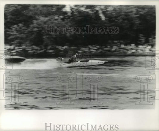 1962 Number 52 boat streaks along the river at Waukesha's Frame Park - Historic Images