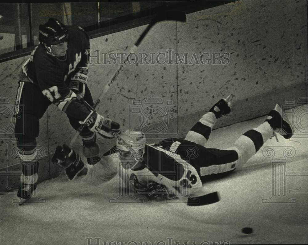 1991 Press Photo Admiral&#39;s Steve Herniman falls chasing Salt Lake player - Historic Images