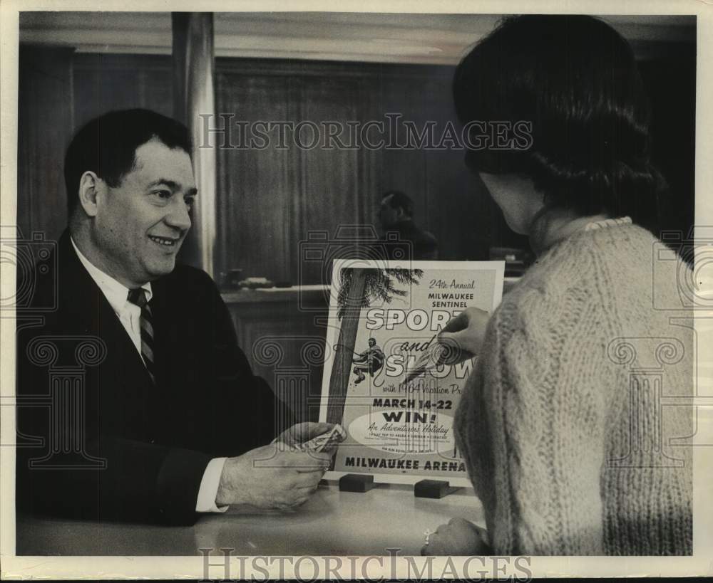 1964 Press Photo Sol Radoff buys first tickets to Milwaukee Sentinel Sports Show - Historic Images