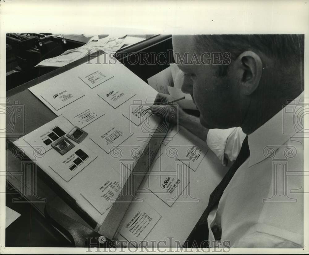 1960, Jack Syndio working on promotion layout for Milwaukee Journal - Historic Images