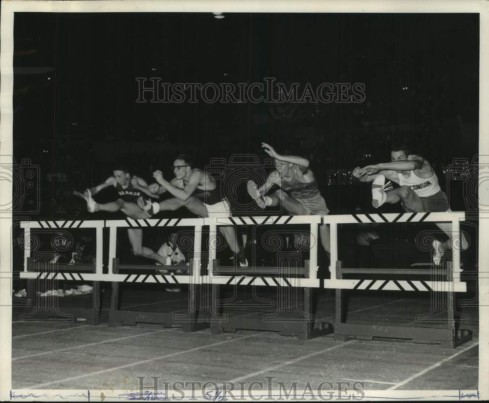 1963 Press Photo High jump runners race at Milwaukee Journal Track Meet, Arena - Historic Images