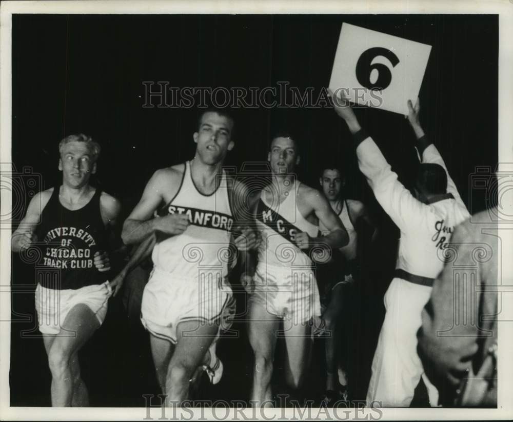 1961 Runners participating in Milwaukee Journal Track meet. - Historic Images