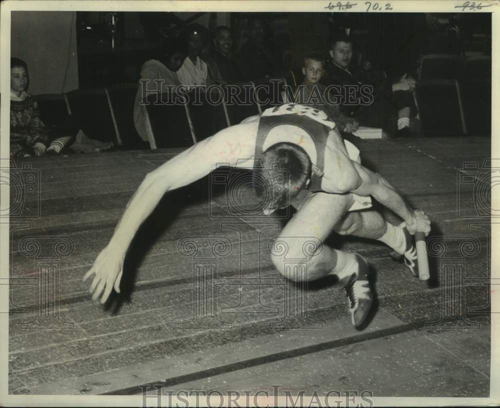1961 Press Photo Jim Gilmore took a spill in Milwaukee Journal track meet-Historic Images