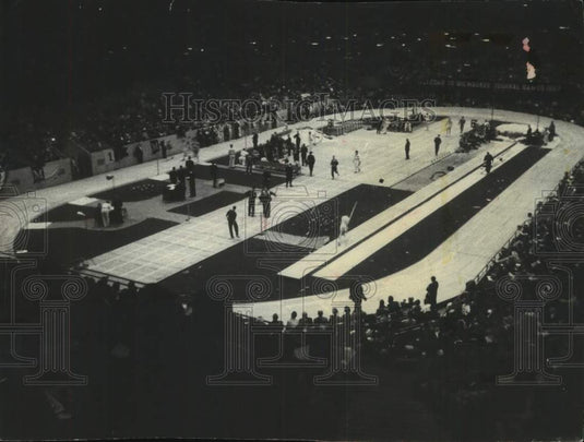 1957 Press Photo Athletes compete and crowd cheers Milwaukee Journal Meet, Arena - Historic Images